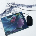 Computer mouse pad